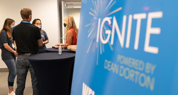 IGNITE Sign and students
